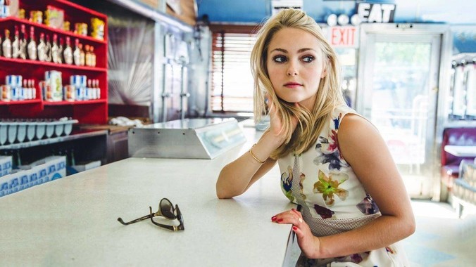 请问照片里这个人是谁呀?